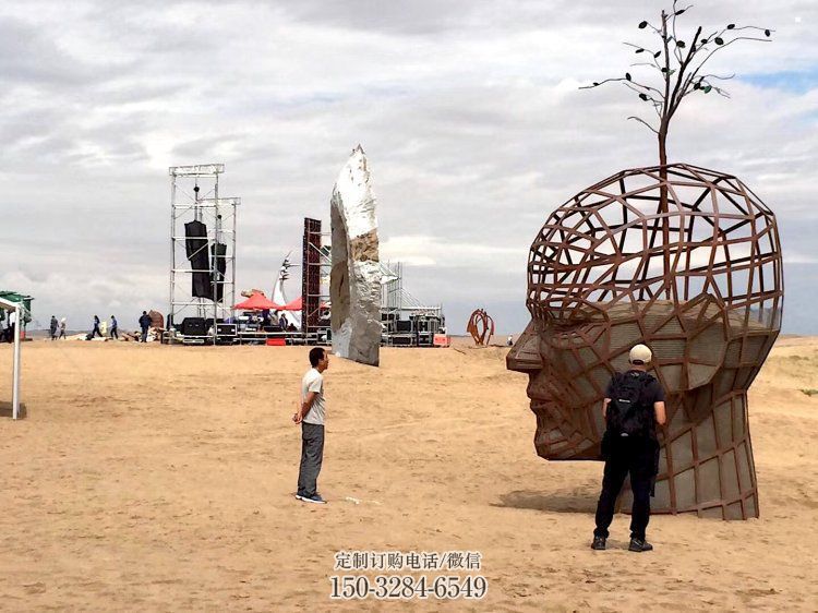 鏤空人頭像雕塑供應(yīng)，城區(qū)小品，鐵藝人頭像雕塑制造商